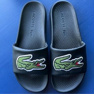 Lacoste men’s slides size 11. Excellent condition